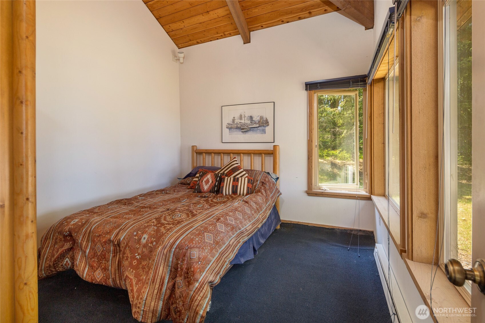 30 Smugglers Cove Road Friday Harbor, WA 98250 - Photo 30 of 39 a bedroom with a bed and a window