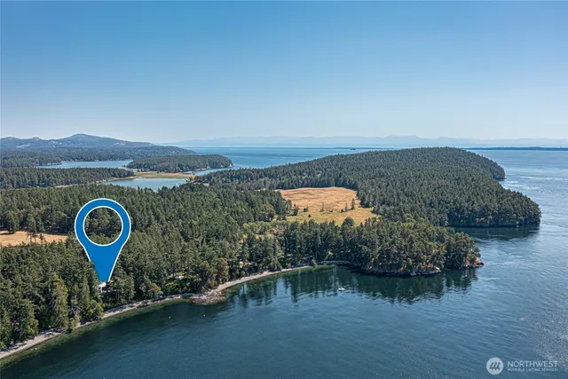 an aerial view of house with yard swimming pool and outdoor seating