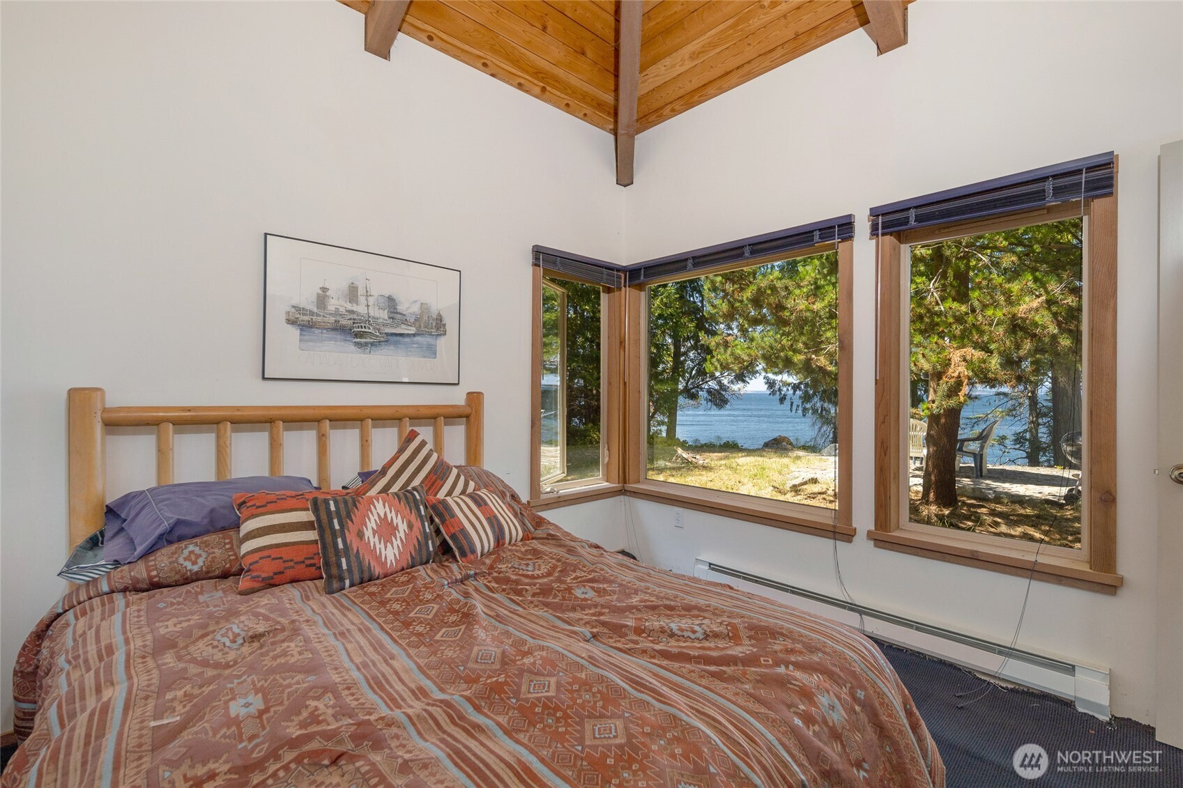 30 Smugglers Cove Road Friday Harbor, WA 98250 - Photo 31 of 39 a bed sitting in a bedroom next to a window