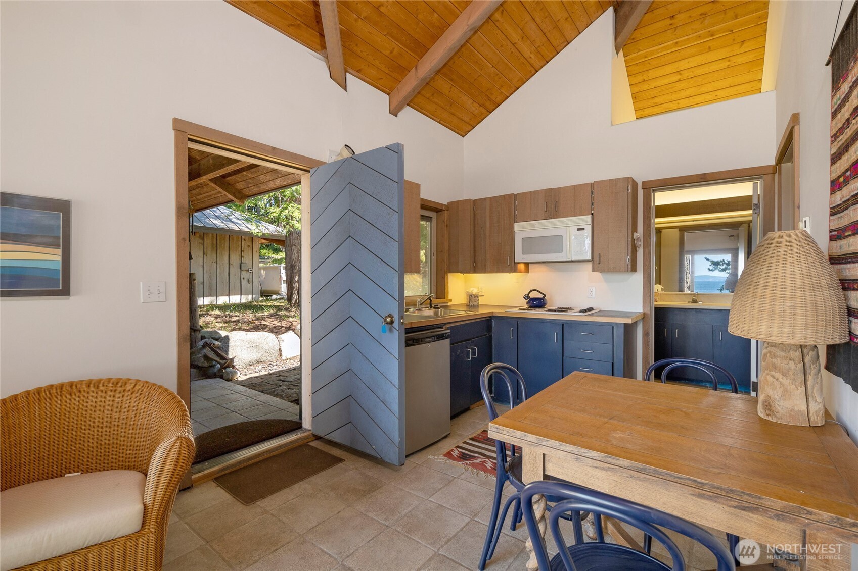 30 Smugglers Cove Road Friday Harbor, WA 98250 - Photo 32 of 39 a dining room with a table and chairs