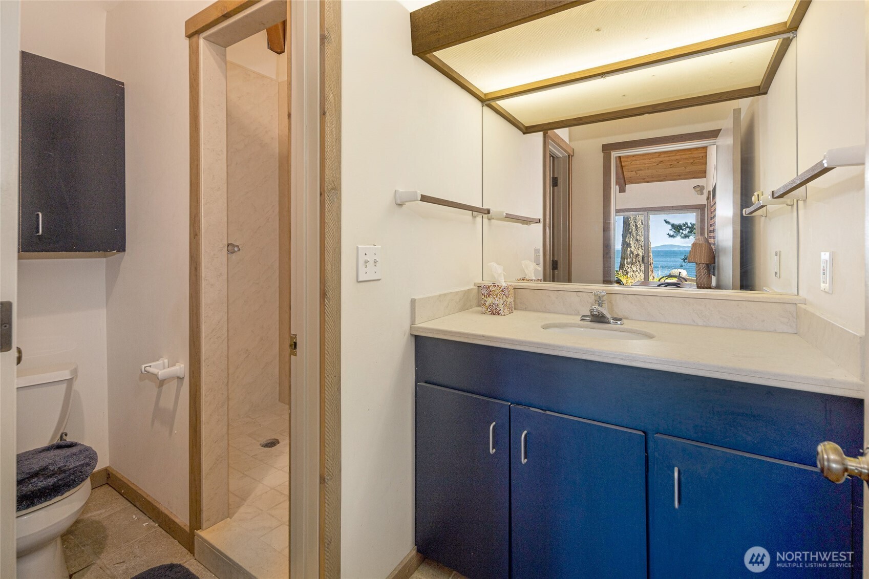 30 Smugglers Cove Road Friday Harbor, WA 98250 - Photo 35 of 39 a bathroom with a double vanity sink and mirror