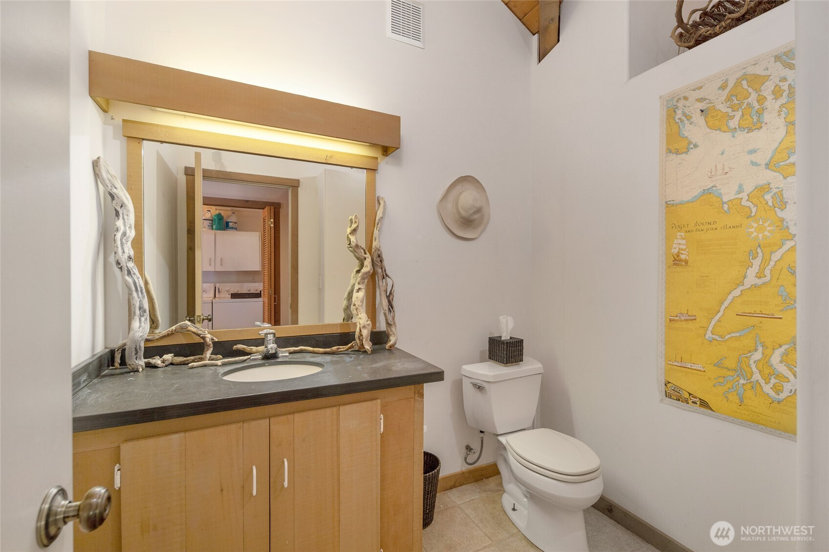 30 Smugglers Cove Road Friday Harbor, WA 98250 - Photo 37 of 39 a bathroom with a granite countertop sink mirror vanity and toilet