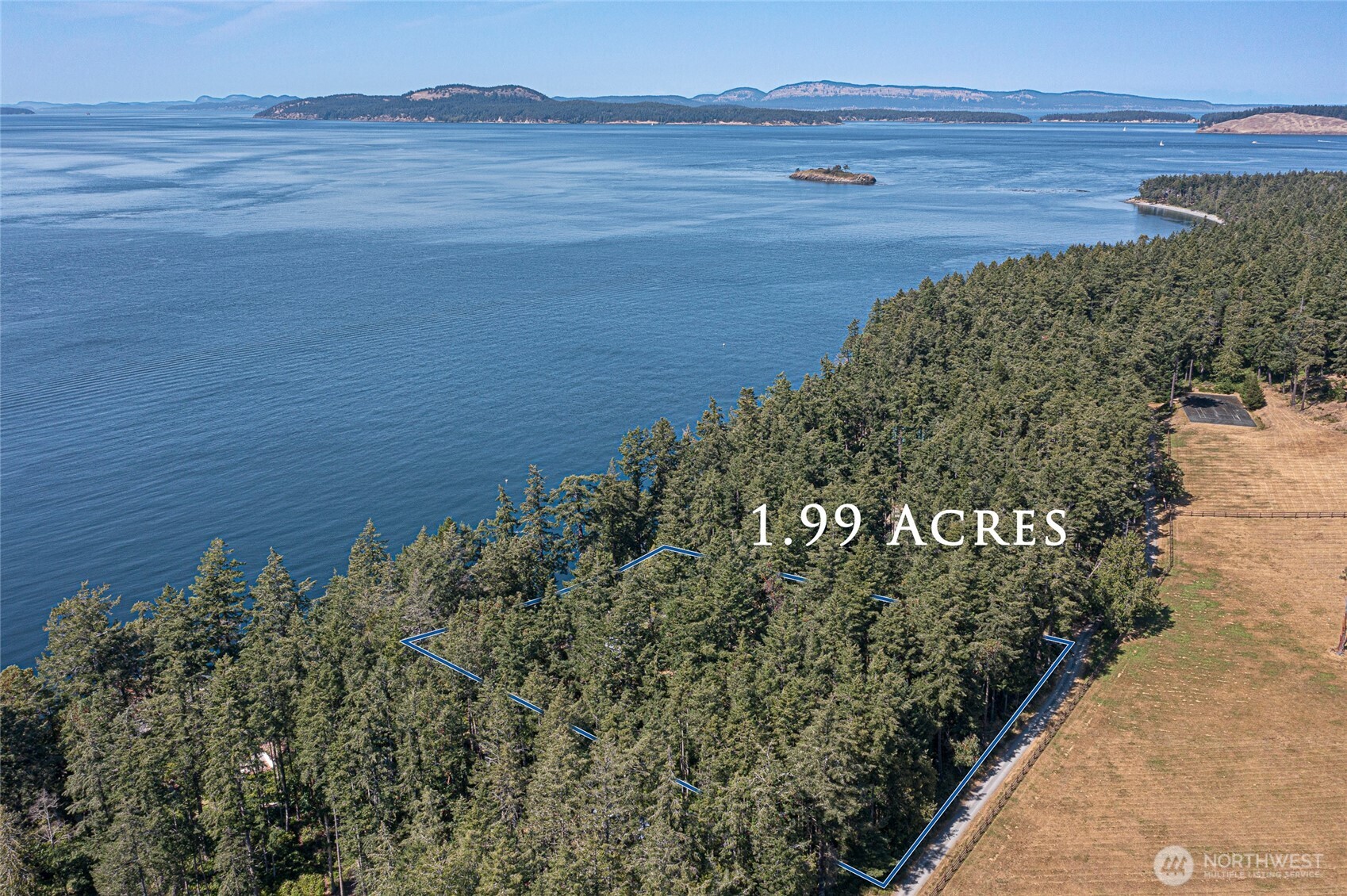 30 Smugglers Cove Road Friday Harbor, WA 98250 - Photo 10 of 39 a view of a lake next to a building