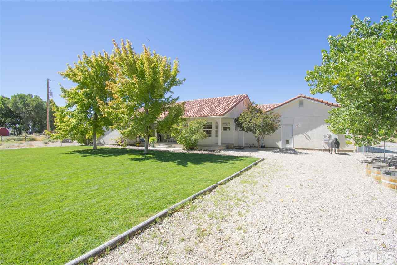5141 Solias Road Fallon, NV 89406 - Photo 3 of 24 a view of a garden with a building in the background