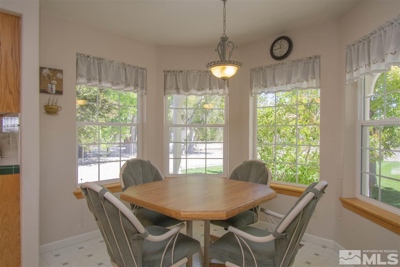 5141 Solias Road Fallon, NV 89406 - Photo 6 of 24 a view of a dining room with furniture window and outside view