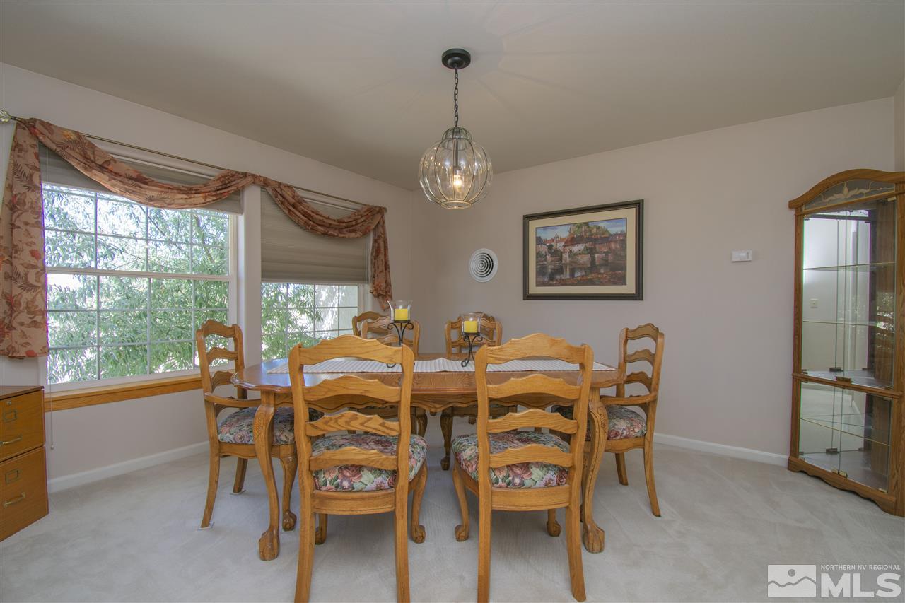 5141 Solias Road Fallon, NV 89406 - Photo 7 of 24 a view of a dining room with furniture window and outside view