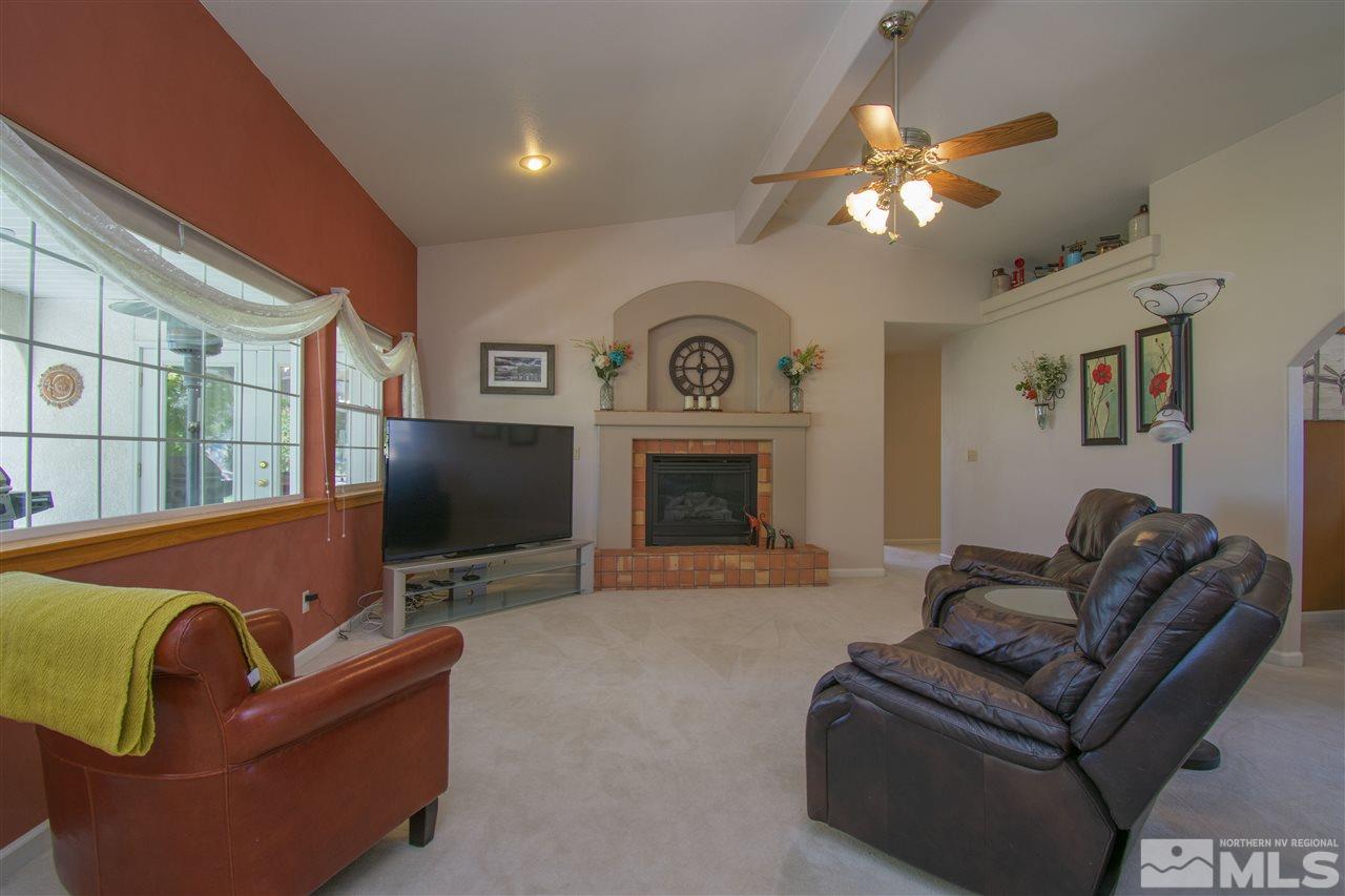 5141 Solias Road Fallon, NV 89406 - Photo 9 of 24 a living room with furniture and a flat screen tv