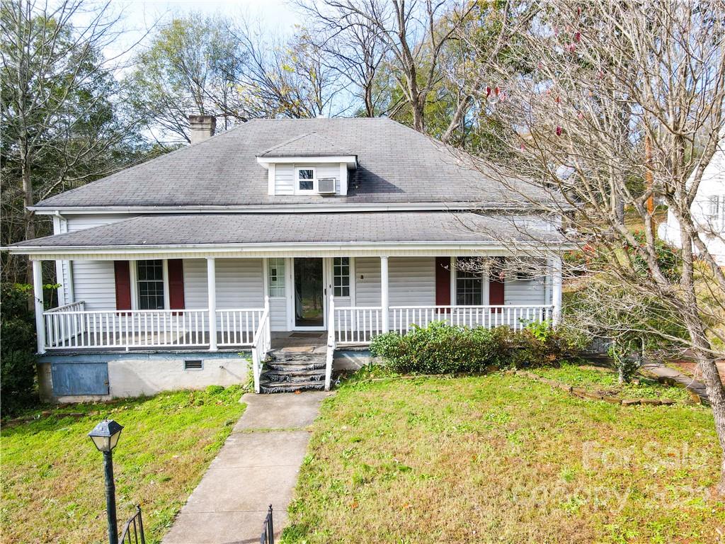 199 North Meridian Street Rutherfordton, NC 28139 - Photo 2 of 39 a front view of house with yard and green space