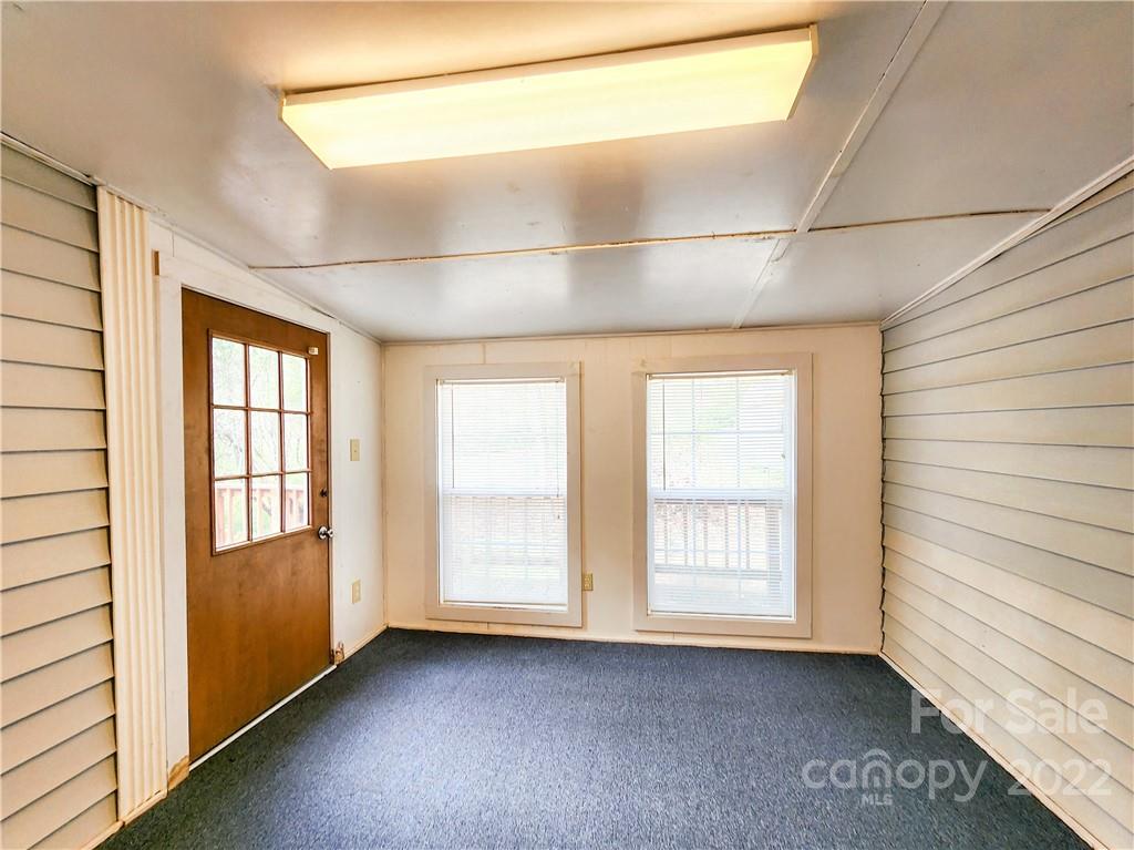 199 North Meridian Street Rutherfordton, NC 28139 - Photo 30 of 39 a view of an empty room with a window