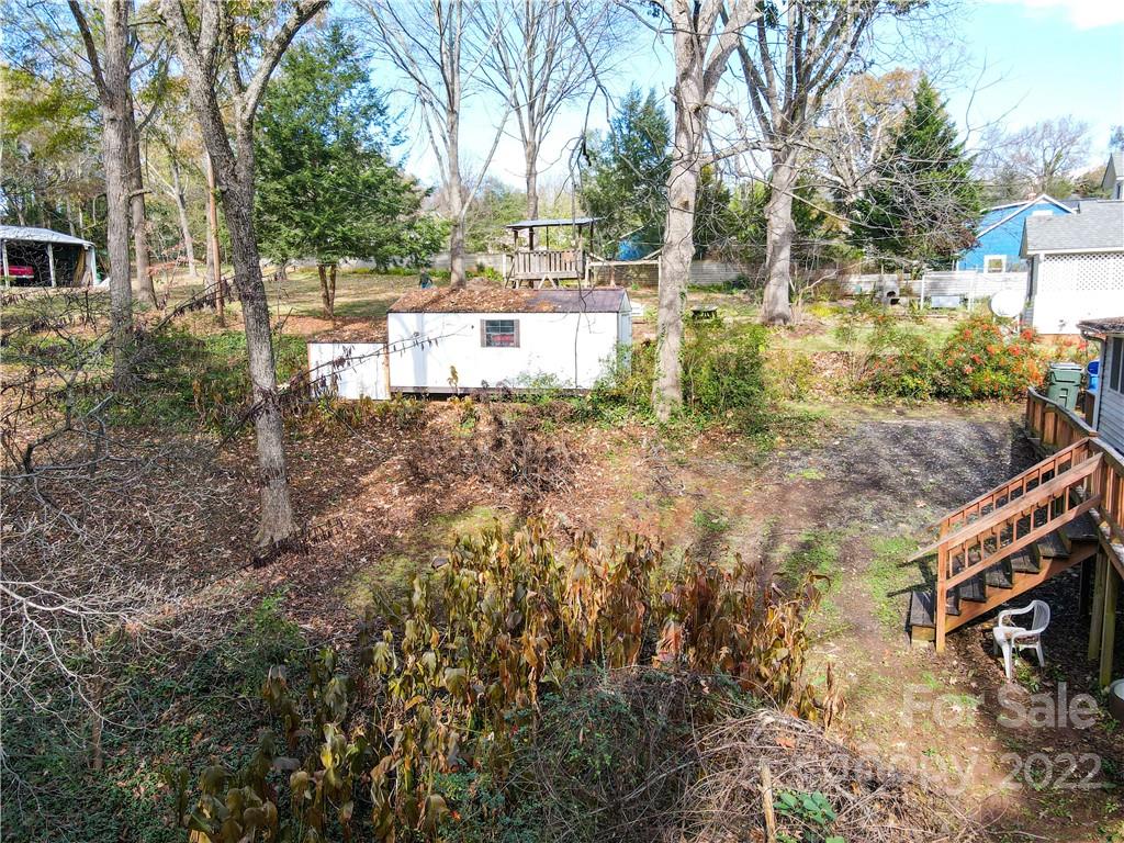 199 North Meridian Street Rutherfordton, NC 28139 - Photo 39 of 39 a backyard of a house with table and chairs