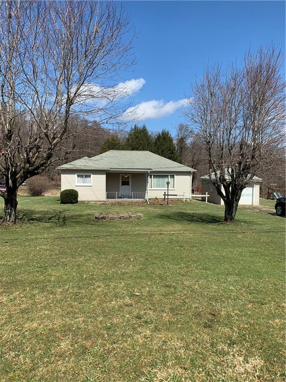 861 Franklin Road Slippery Rock, PA 16057 - Photo 1 of 9 a front view of house with yard and green space