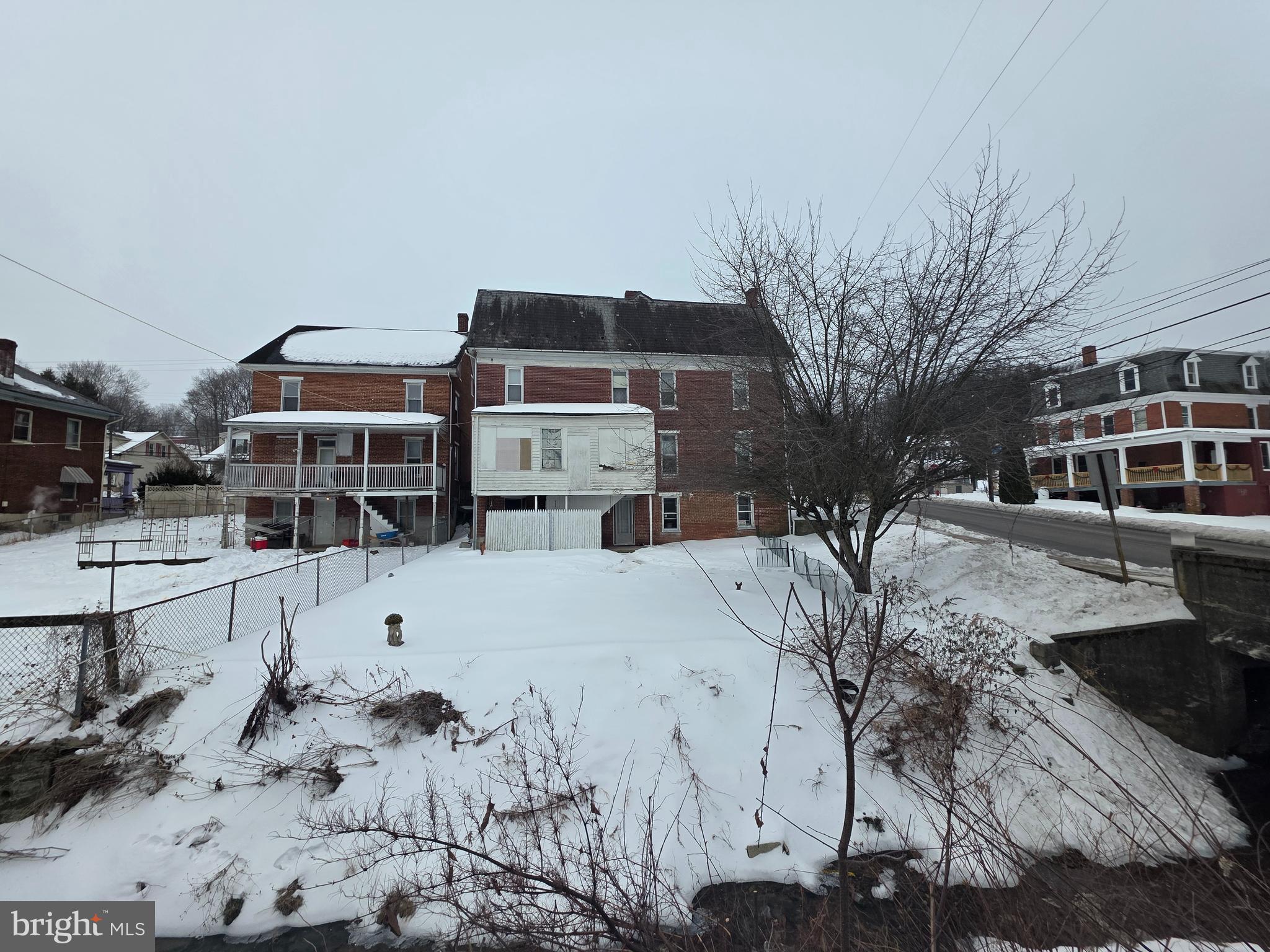 178 West Main Street Windsor, PA 17366 - Photo 11 of 46 a view of residential houses with snow on the road