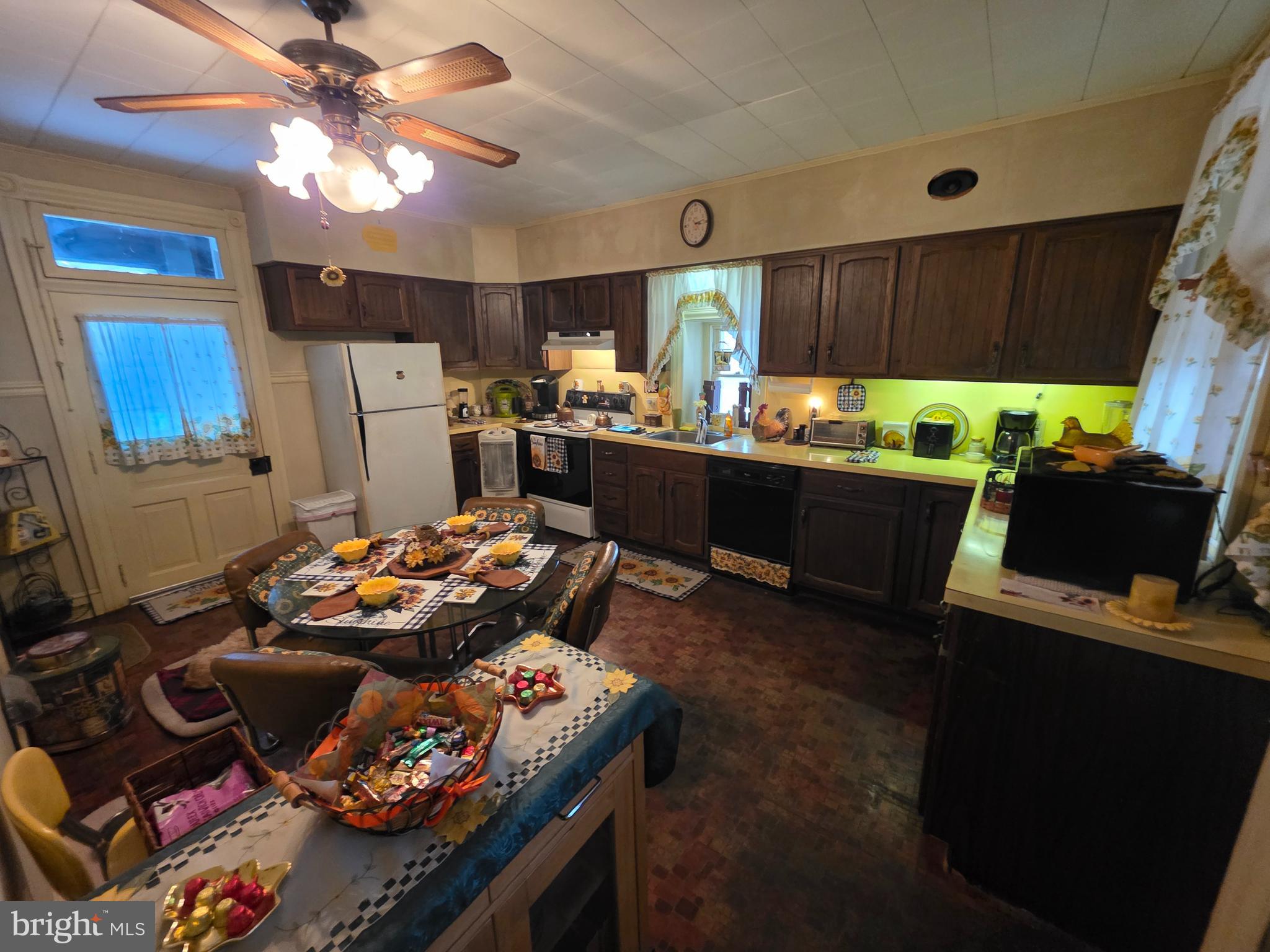178 West Main Street Windsor, PA 17366 - Photo 13 of 46 a kitchen with a table and chairs