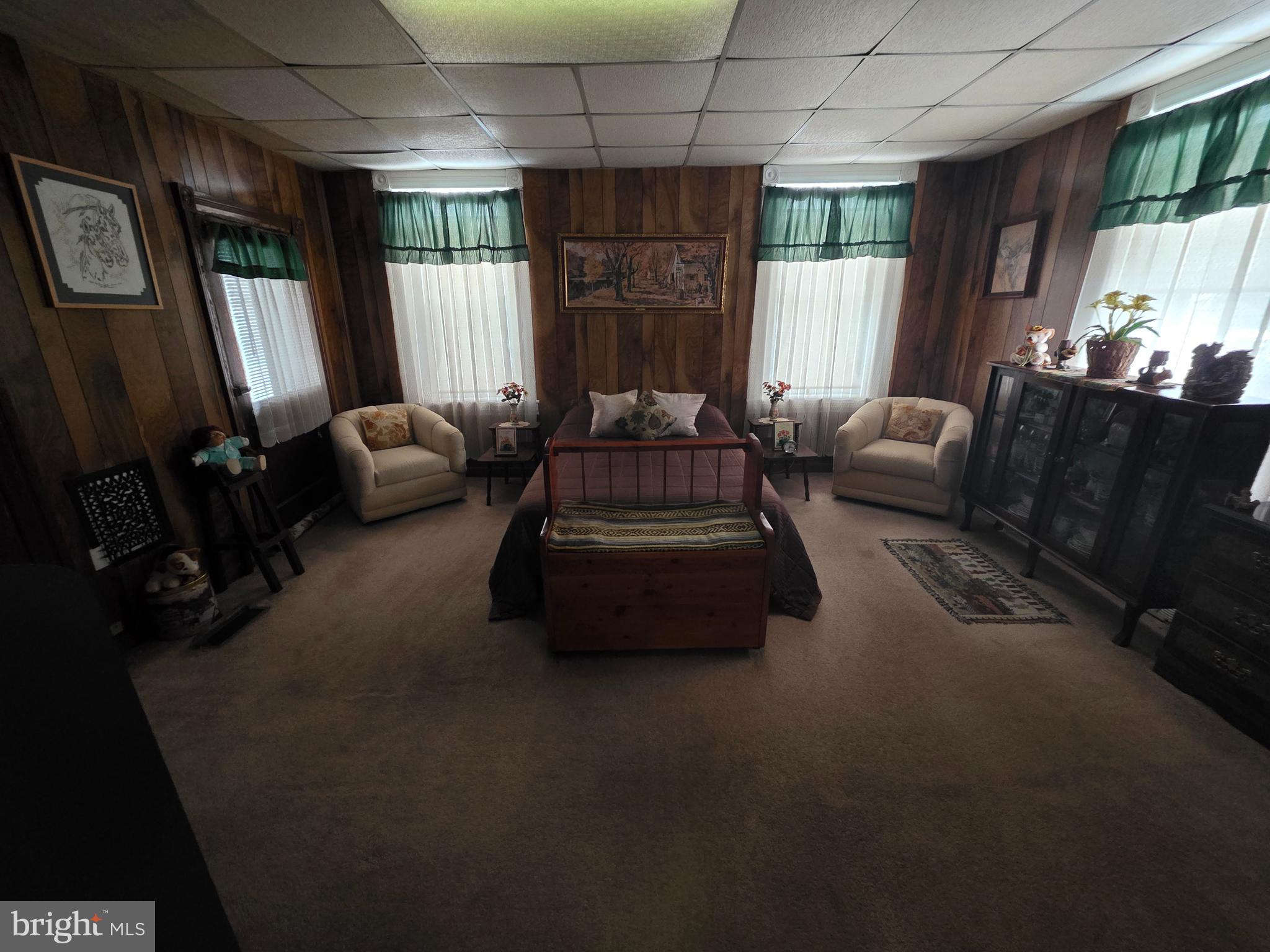 178 West Main Street Windsor, PA 17366 - Photo 20 of 46 a living room with furniture fireplace and large windows