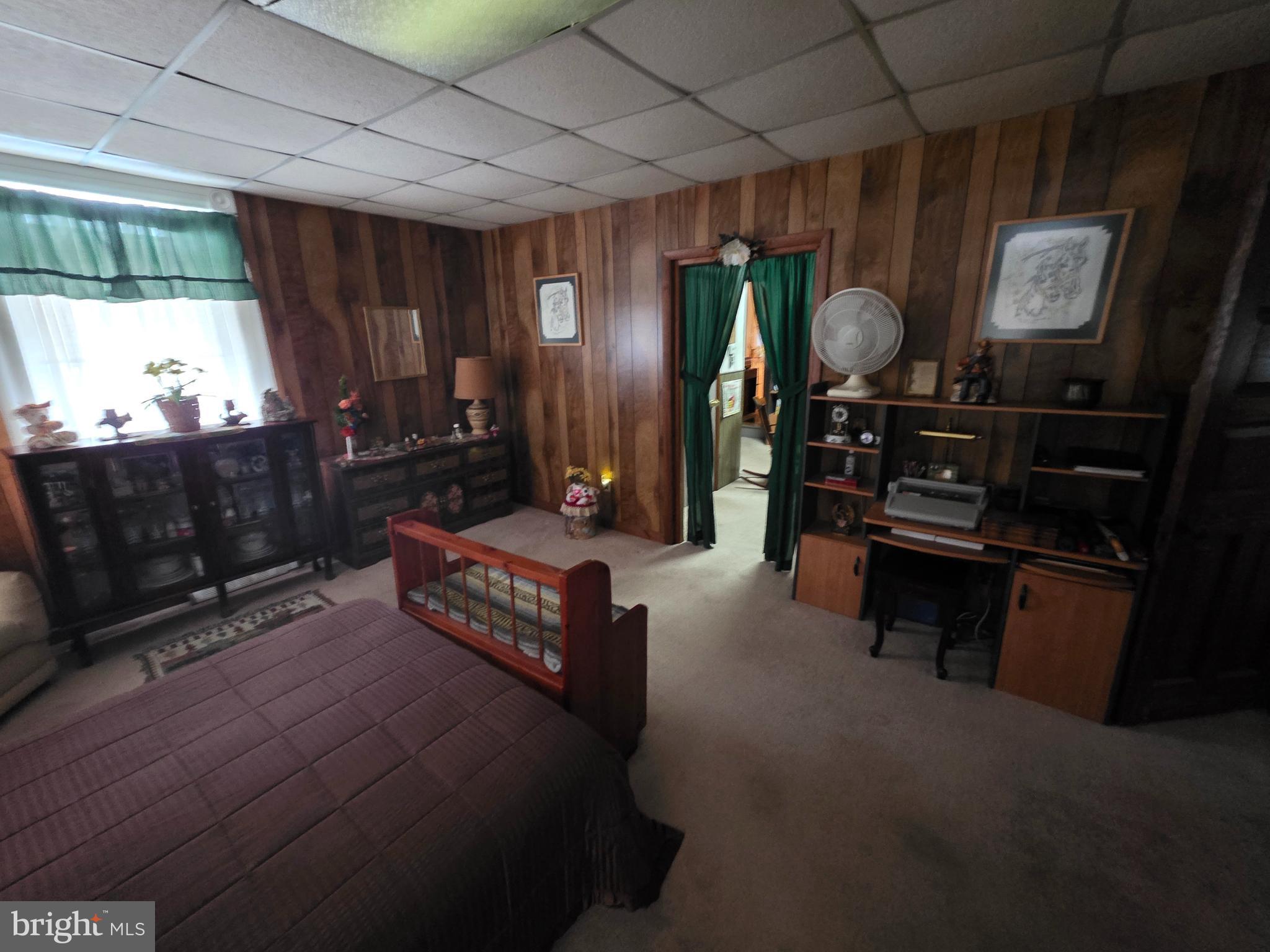 178 West Main Street Windsor, PA 17366 - Photo 22 of 46 a living room with furniture a flat screen tv and a fireplace