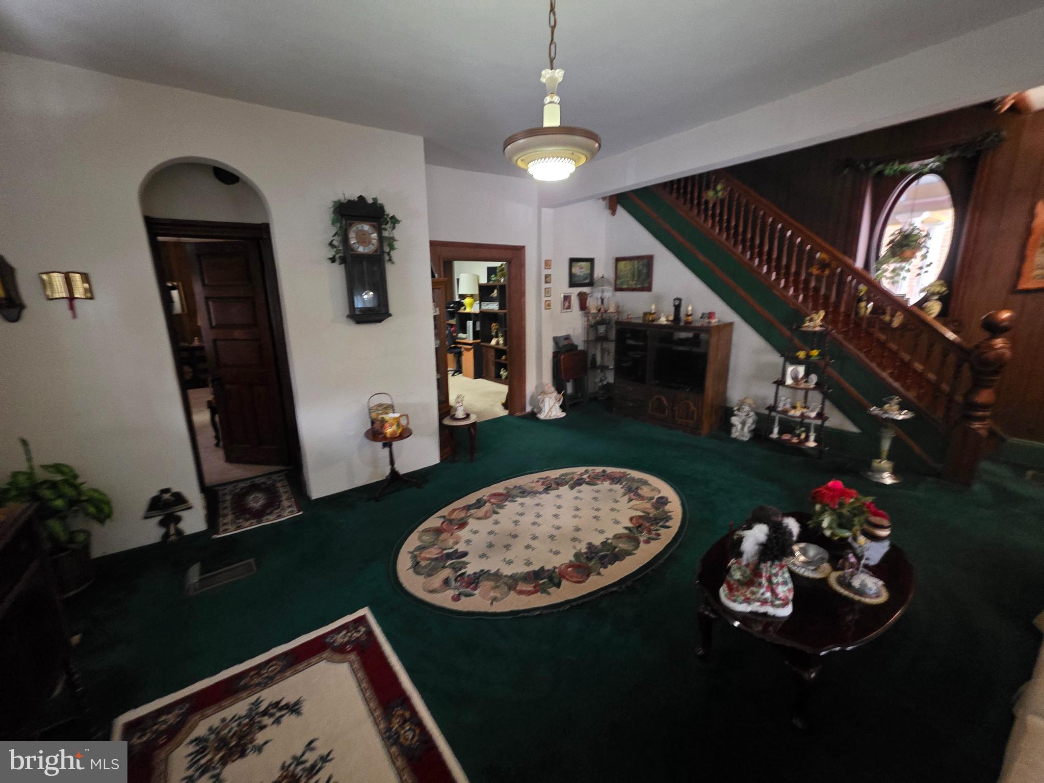 178 West Main Street Windsor, PA 17366 - Photo 24 of 46 a living room with furniture and a chandelier