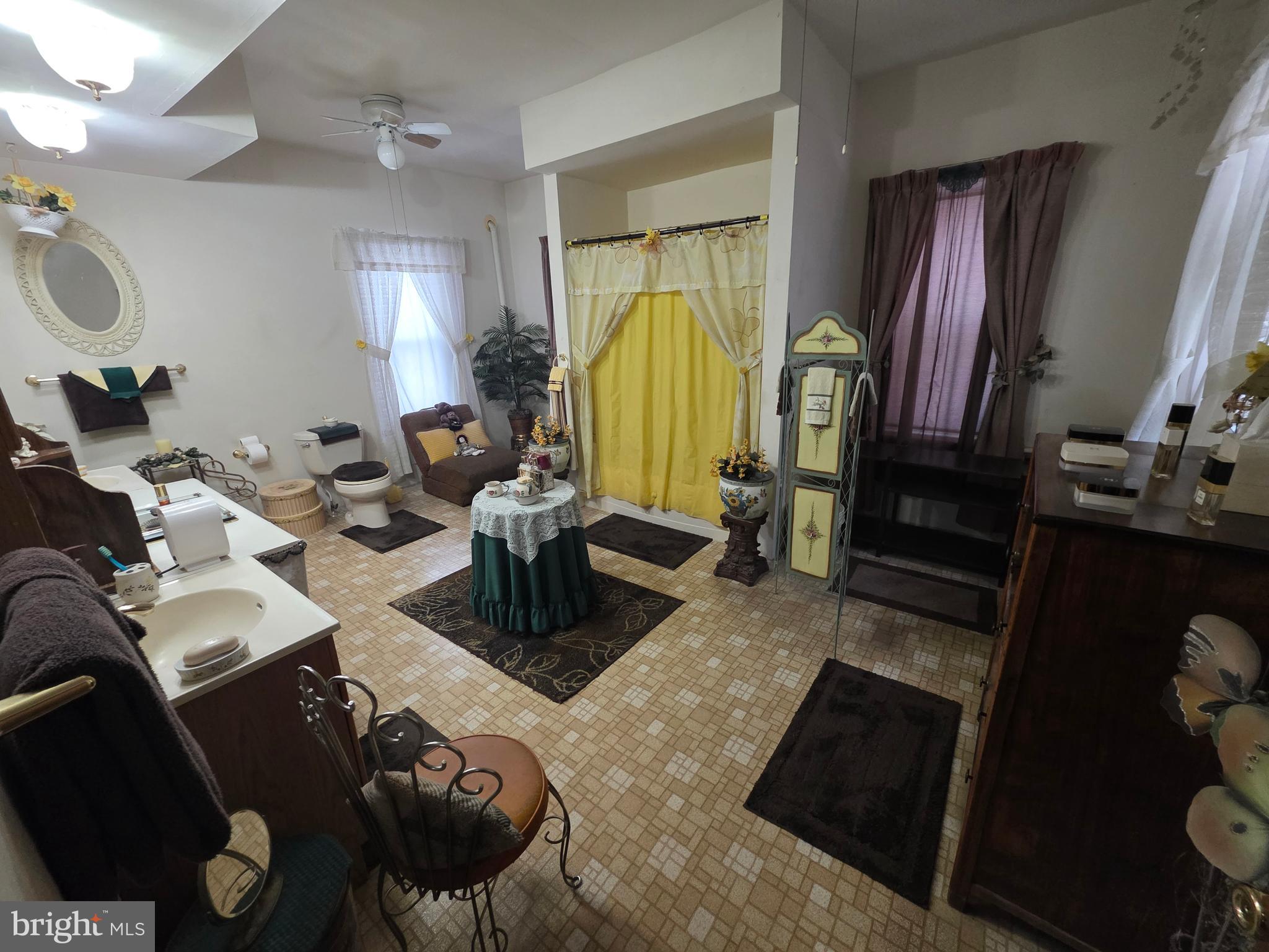 178 West Main Street Windsor, PA 17366 - Photo 28 of 46 a living room with furniture a lamp and a window