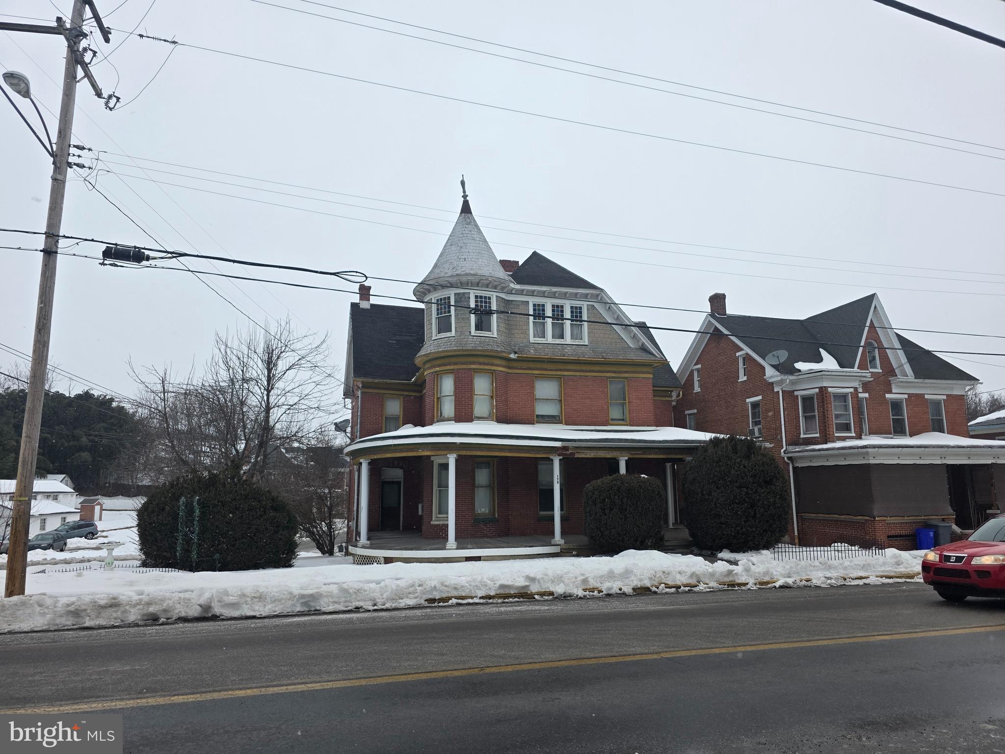 178 West Main Street Windsor, PA 17366 - Photo 3 of 46 a front view of a house with a road