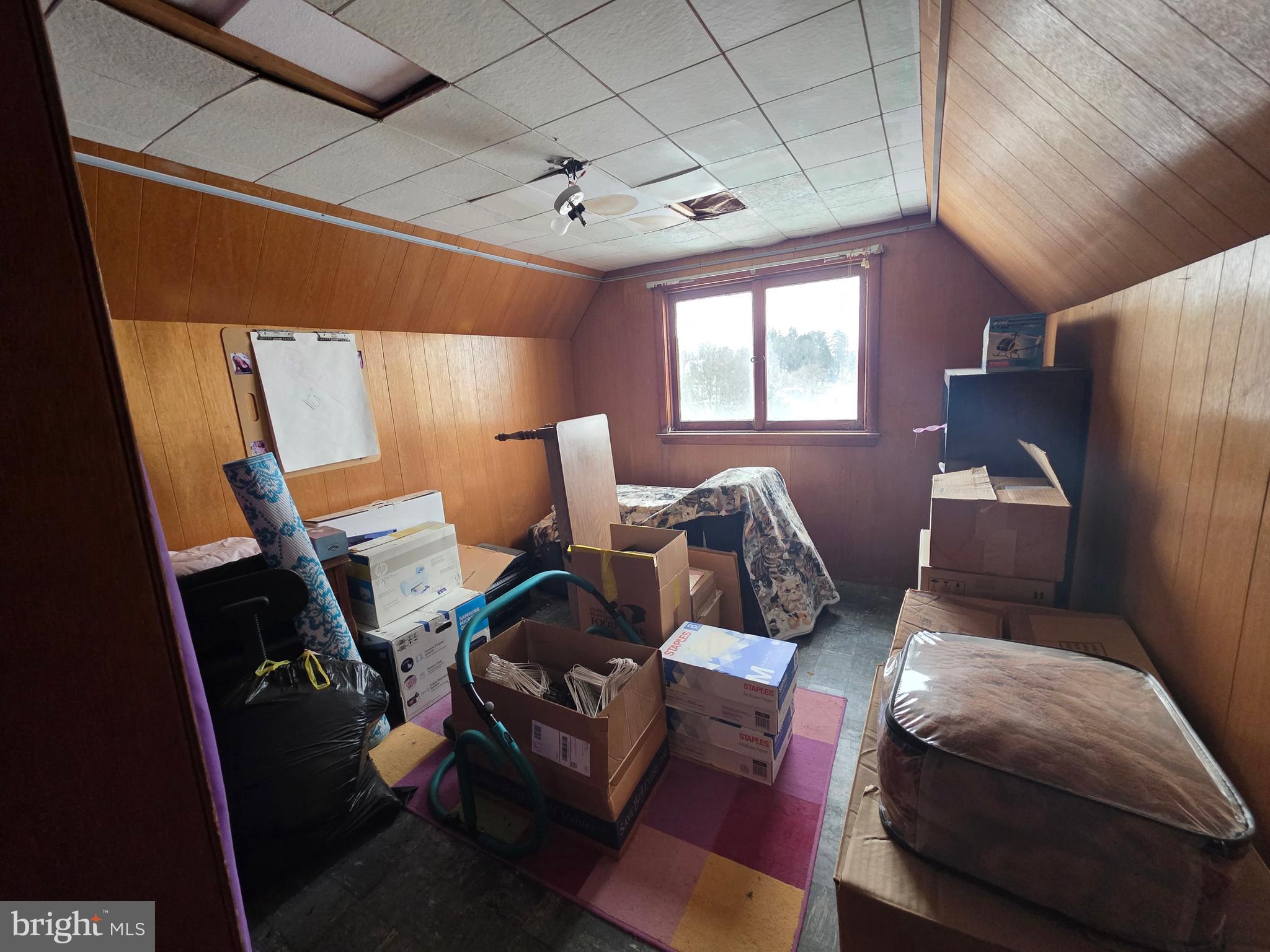 178 West Main Street Windsor, PA 17366 - Photo 42 of 46 a bed room with a bed and a chair