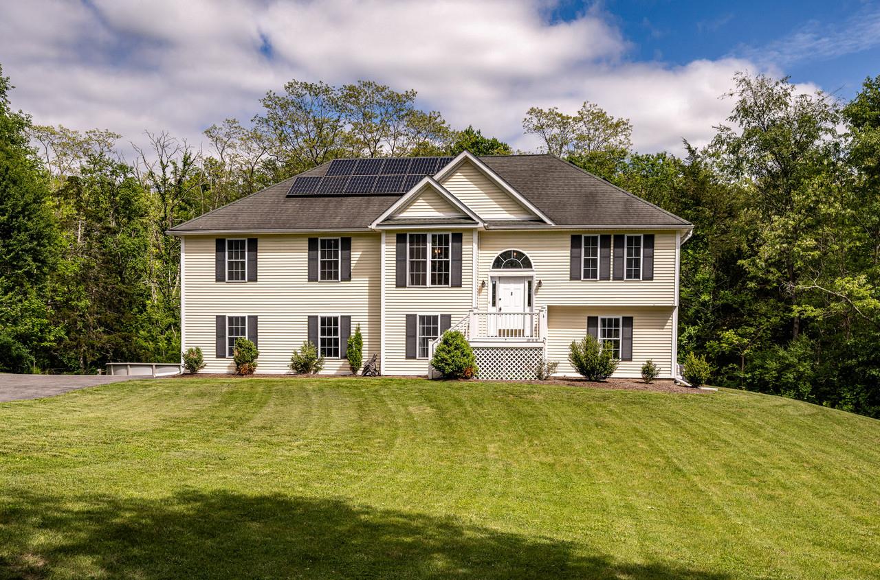 5692 Highway 82 Clinton Corners, NY 12514 - Photo 1 of 42 a white house with a large windows plants and large trees