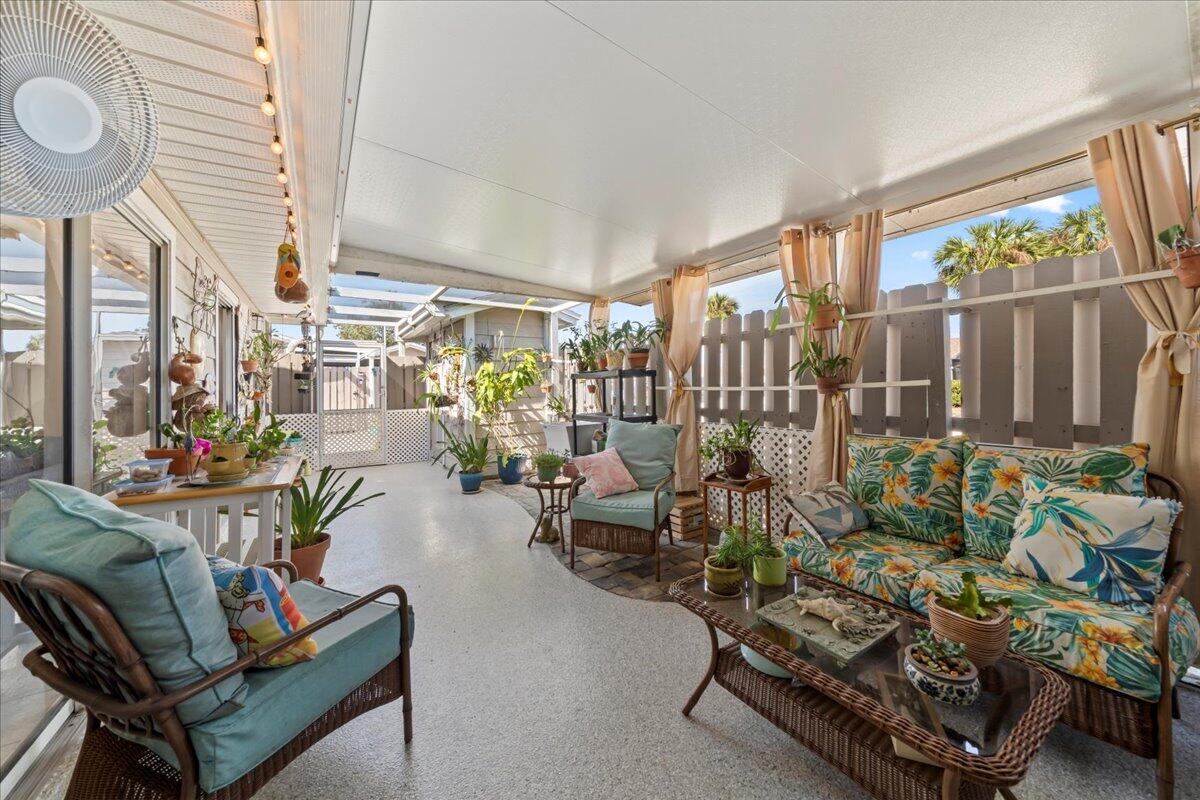 1935 Quail Ridge Court, Unit 202 Cocoa, FL 32926 - Photo 4 of 23 Screen Enclosed Courtyard