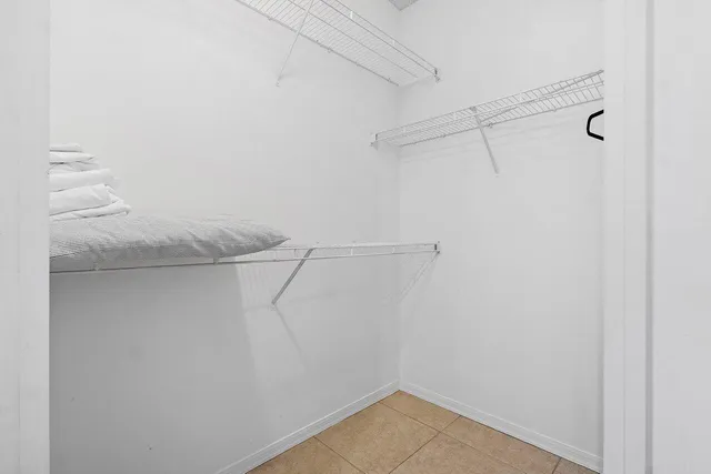 a view of a room with racks on the wall