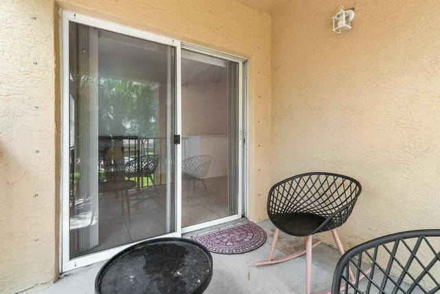 a view of a bedroom and bathroom