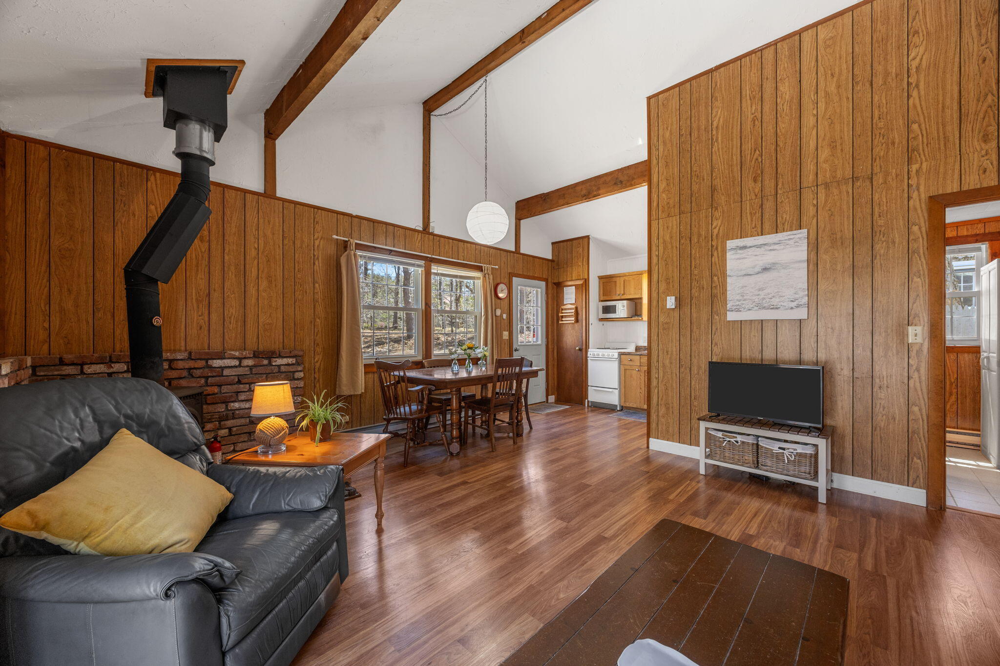 60 Long Avenue, Unit A Wellfleet, MA 02667 - Photo 12 of 28 a living room with furniture and a window