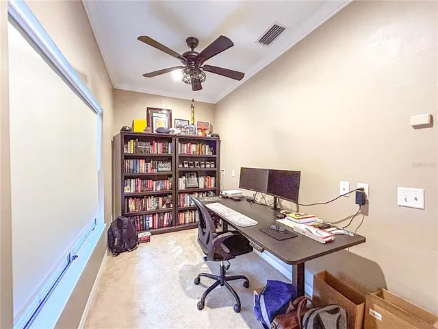 a view of a workspace with furniture