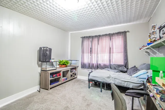 a room with furniture and window