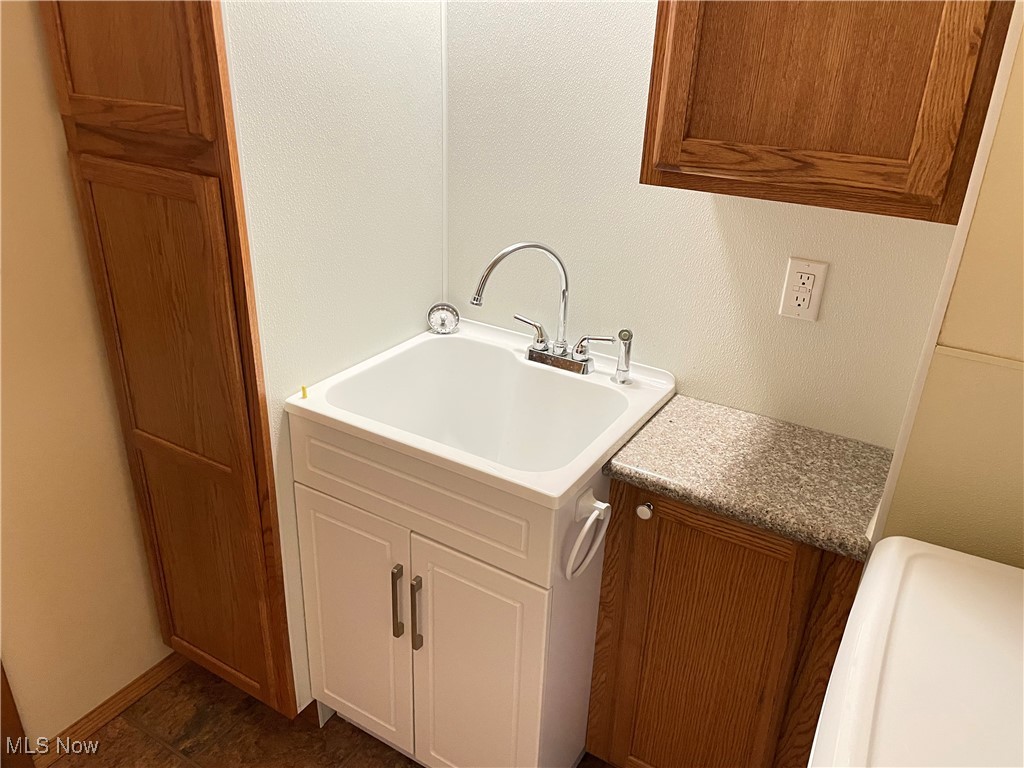 1381 Robb Road Conneaut, OH 44030 - Photo 30 of 50 Laundry area featuring a sink
