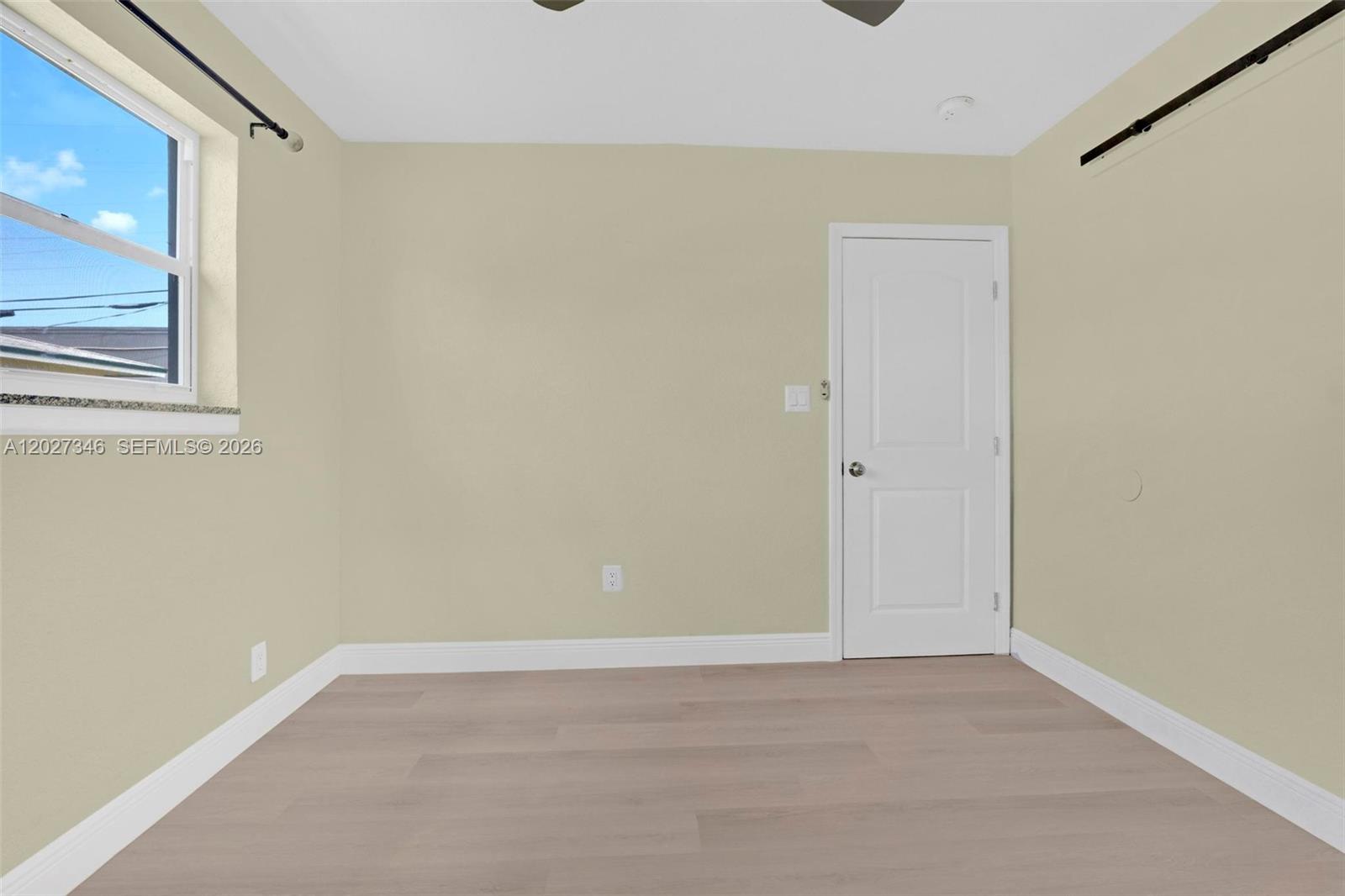 369 Phippen Waiters Road, Unit FRONT Dania Beach, FL 33004 - Photo 18 of 19 a view of an empty room