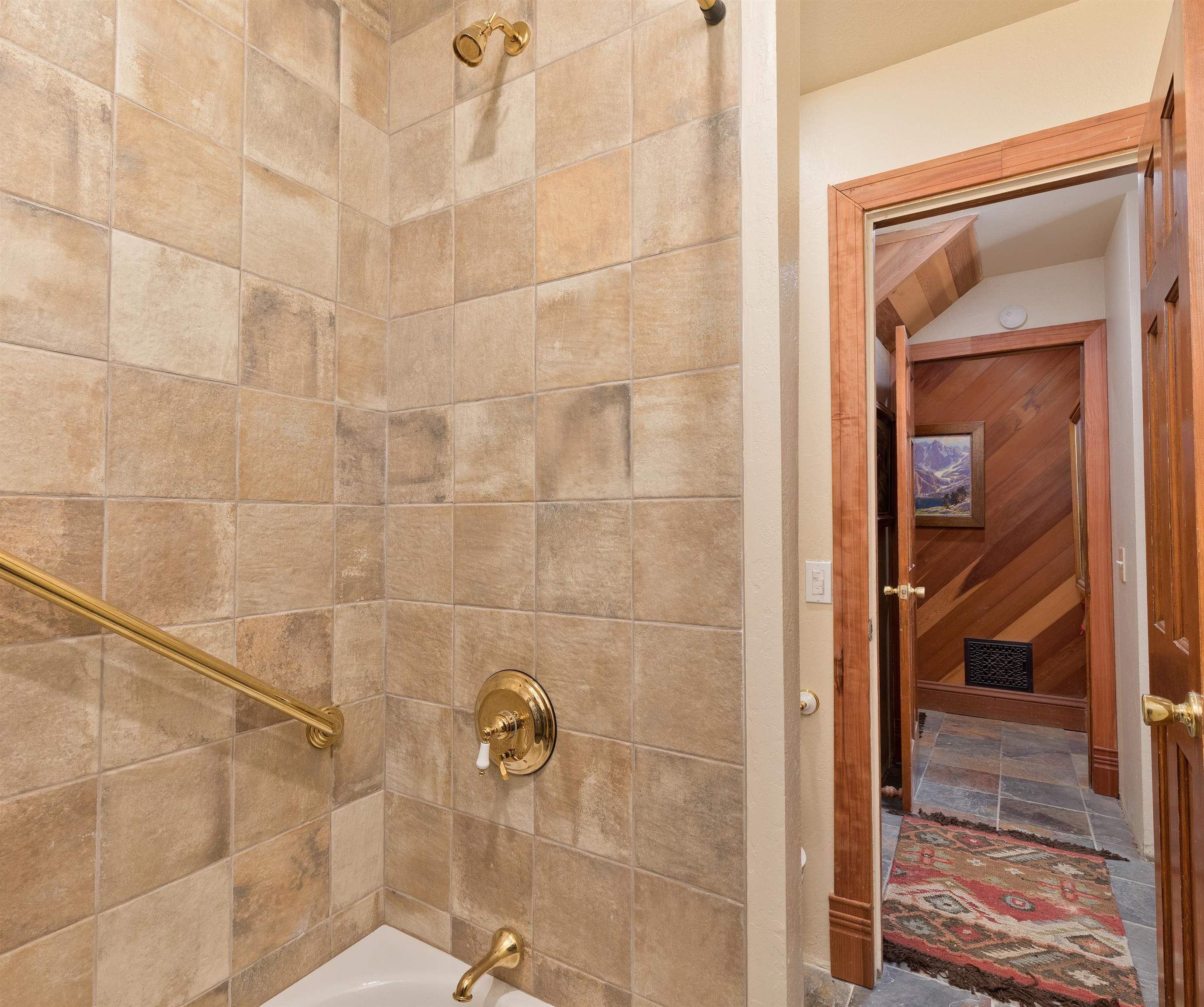 91 St Moritz Road Mammoth Lakes, CA 93546 - Photo 12 of 34 a bathroom with a shower