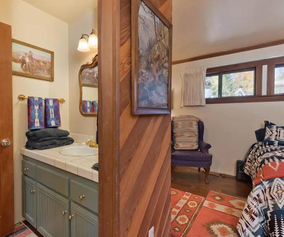 a bedroom with a bed and furniture