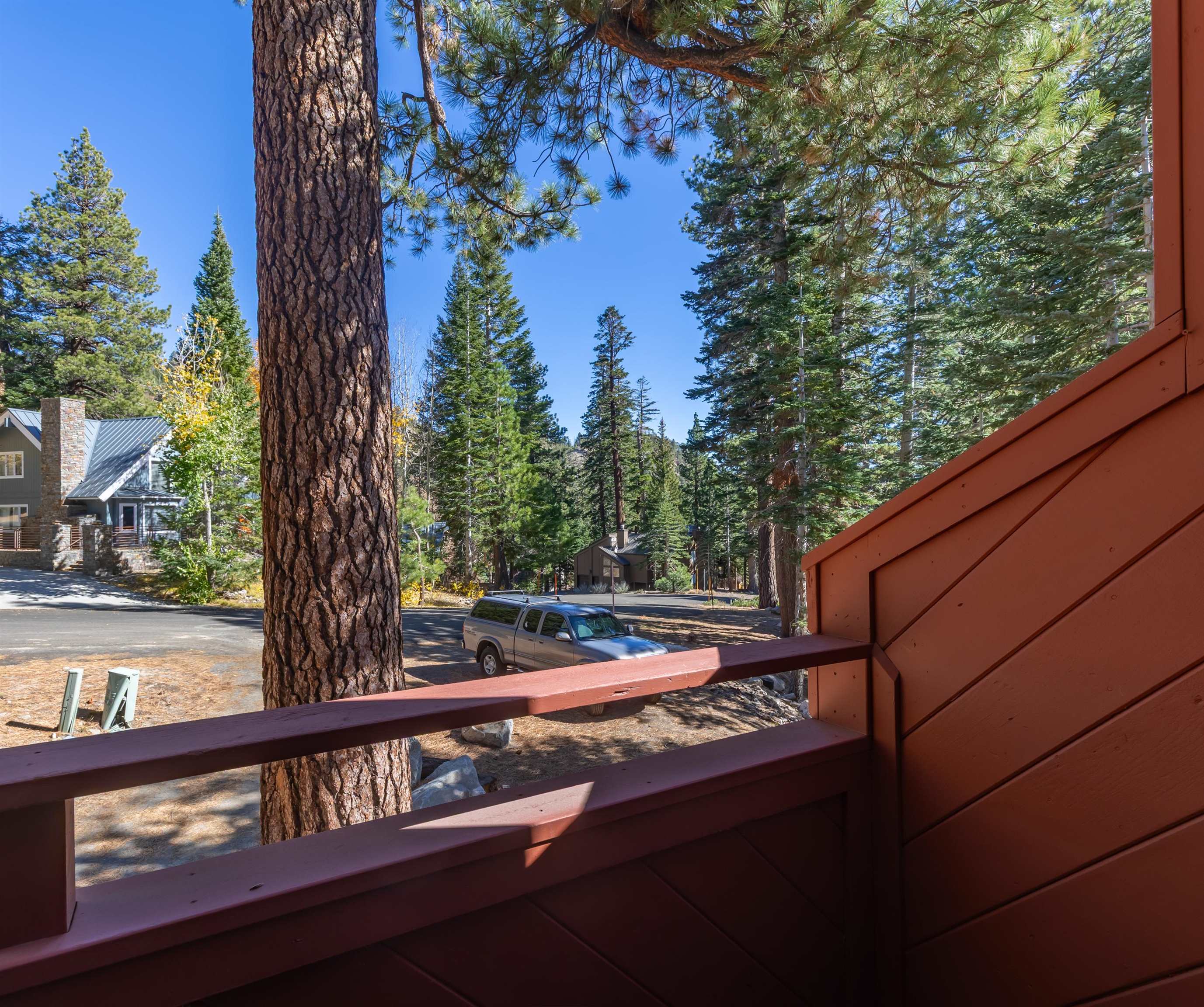 91 St Moritz Road Mammoth Lakes, CA 93546 - Photo 28 of 34 a view of a balcony with tree