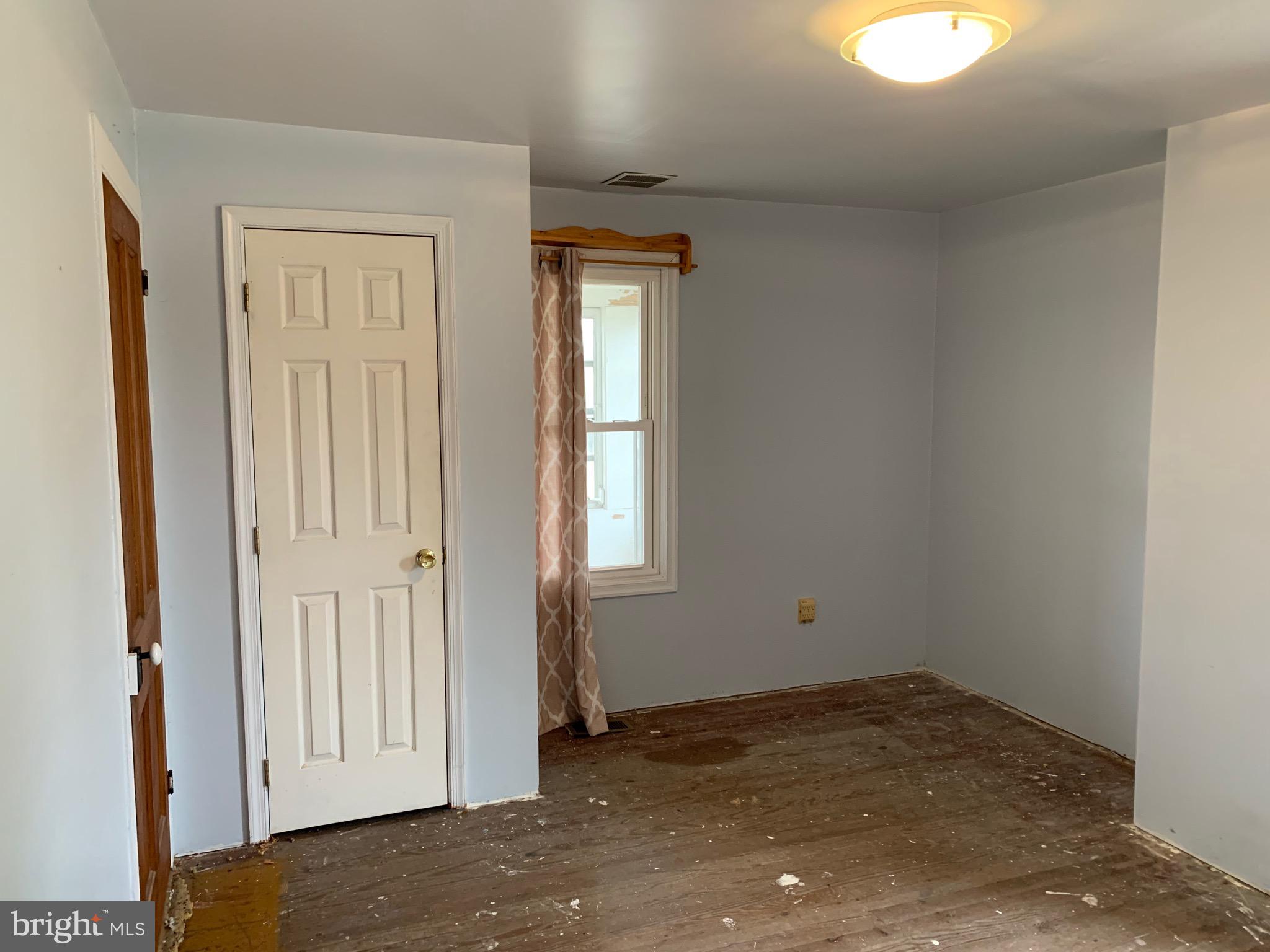 13457 Holly Road Greensboro, MD 21639 - Photo 19 of 22 Downstairs main bed room. Original Hardwood floors