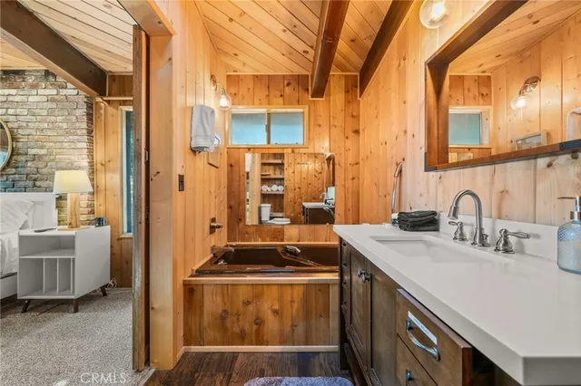 a kitchen with a sink and a stove top oven