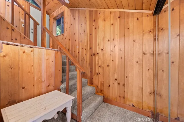 a view of a balcony with wooden floor
