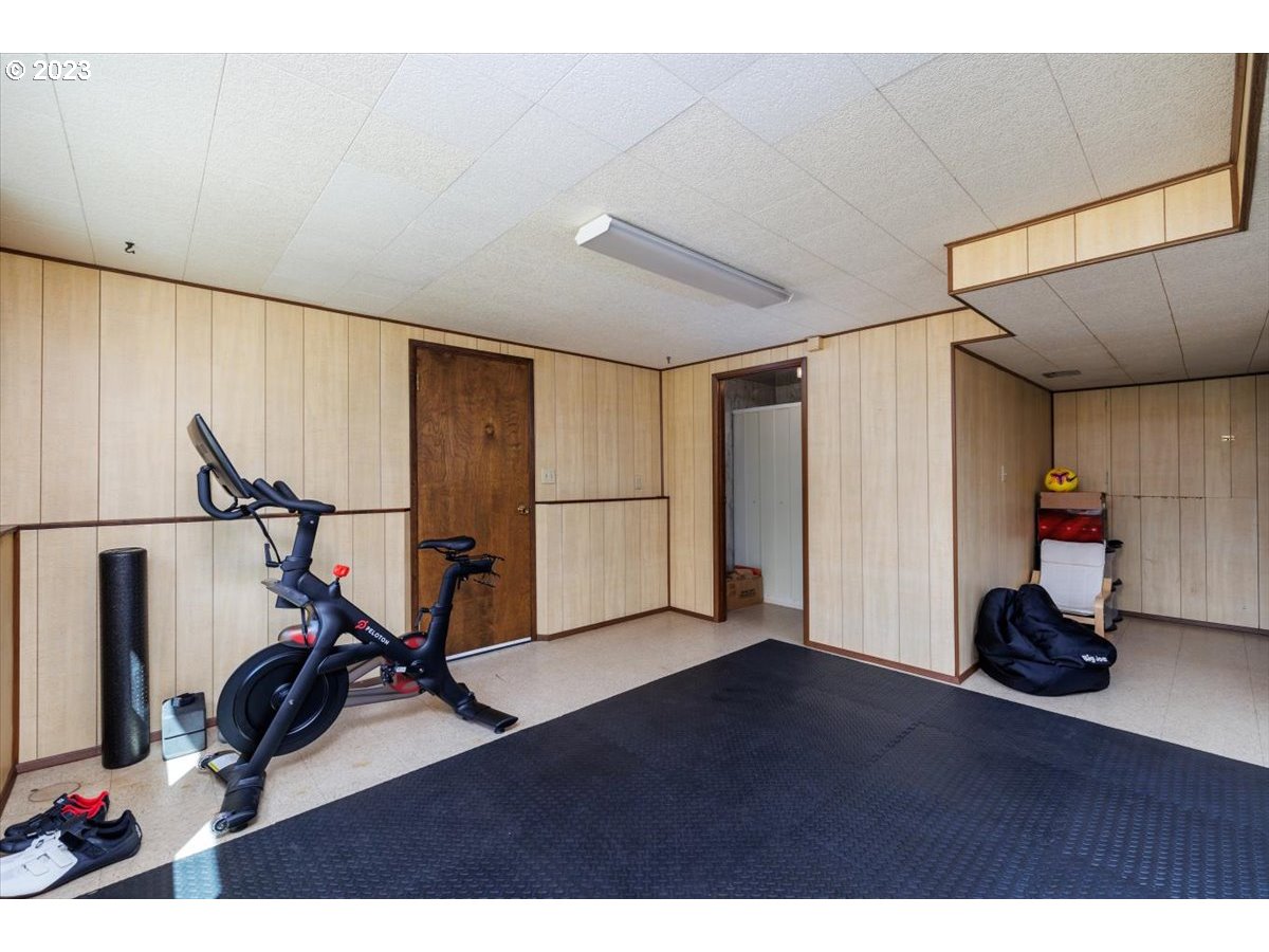 7519 Southwest 53rd Avenue Portland, OR 97219 - Photo 22 of 30 a view of a room with gym equipment