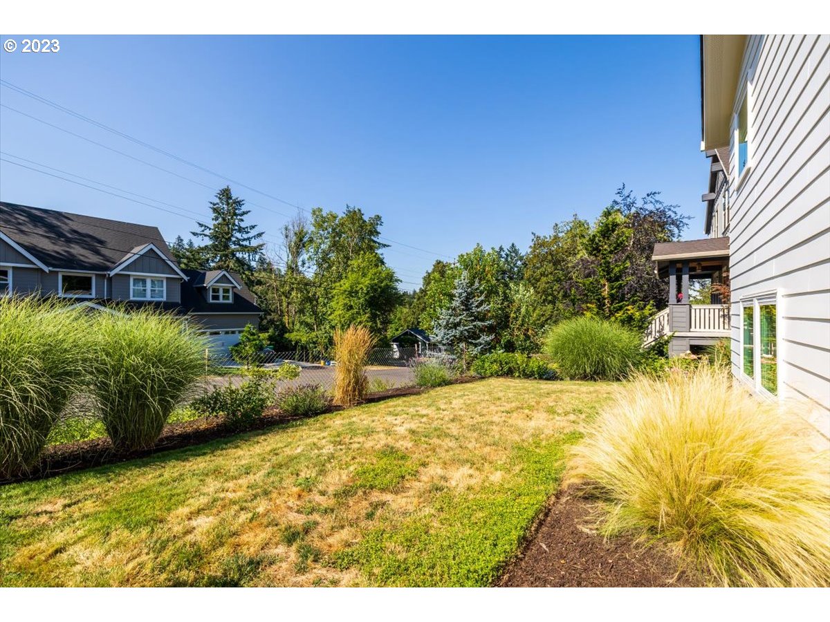 7519 Southwest 53rd Avenue Portland, OR 97219 - Photo 25 of 30 a view of swimming pool with a yard
