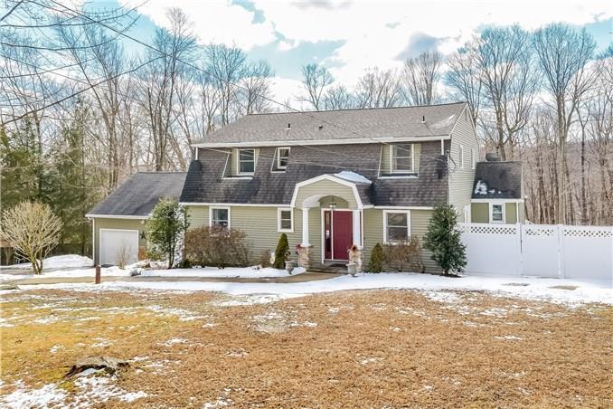 22 Chambers Road Danbury, CT 06811 - Photo 1 of 1 a front view of a house with a yard