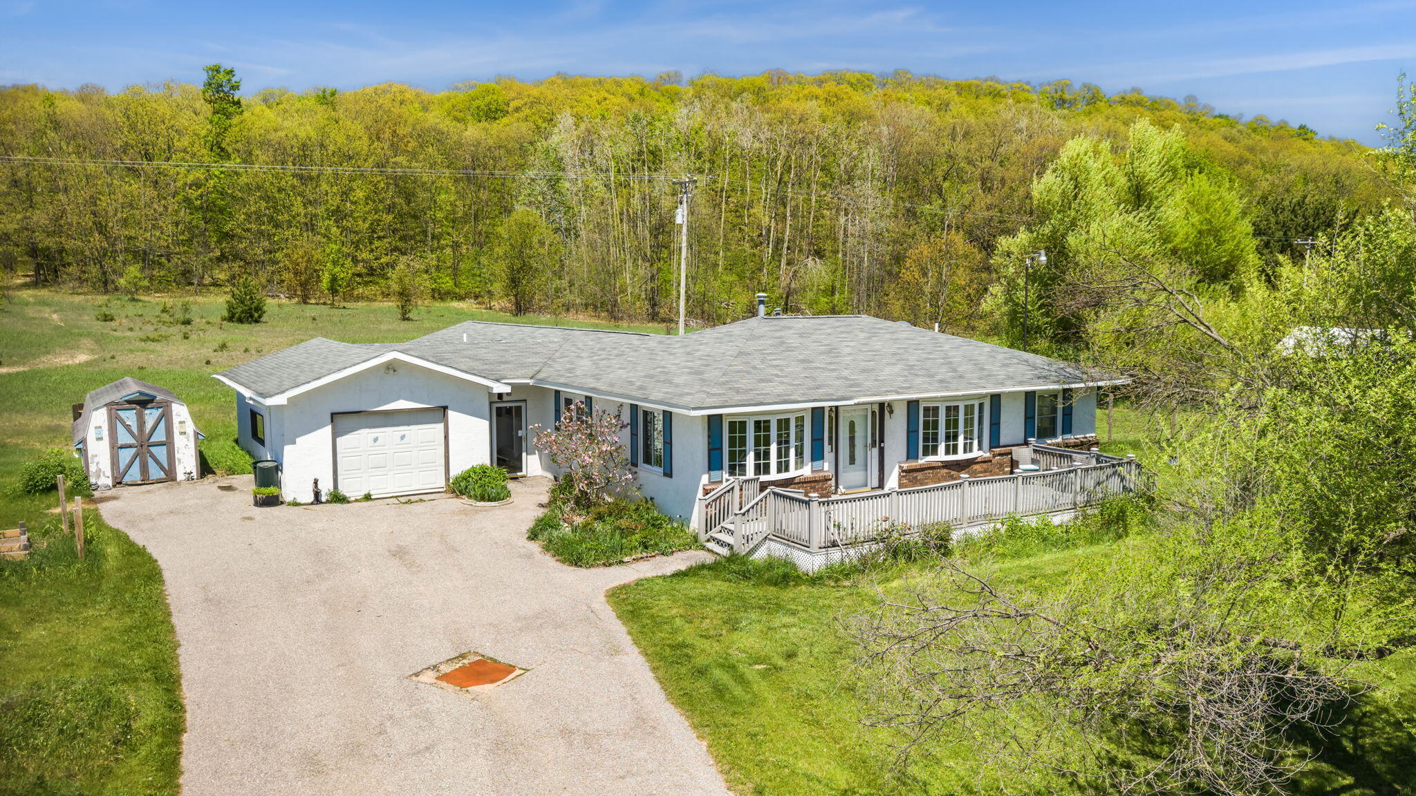 688 East Alexander Road Vanderbilt, MI 49795 - Photo 1 of 58 1-web-or-mls-DJI_20260526143232_0016_D