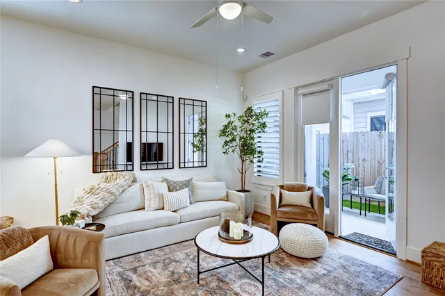 a view of a pathway of a building with wooden fence