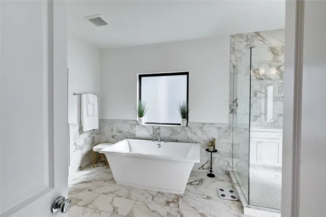 an aerial view of a house with a garden