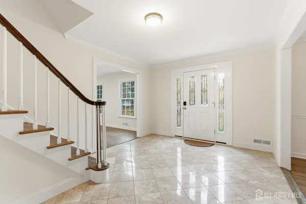 a view of an entryway with staircase