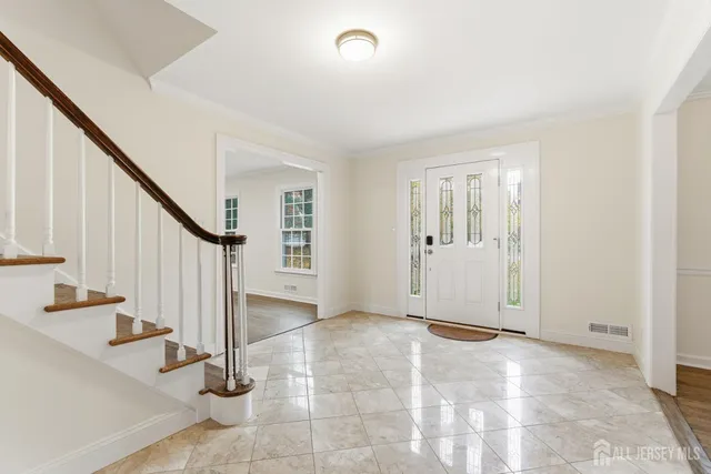 a view of an entryway with staircase