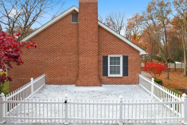 a view of playground with basketball court