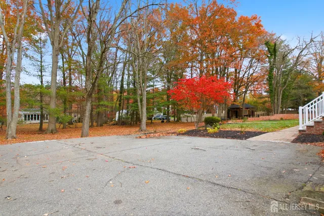 a view of a swimming pool with an outdoor seating