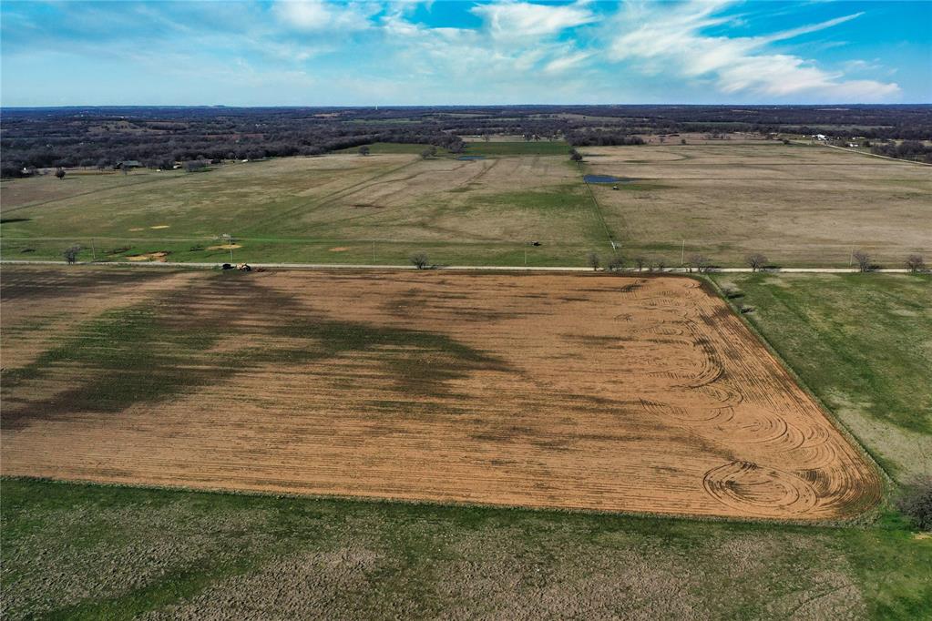 1300 Baseline Road Hennepin, OK 73444 - Photo 2 of 4 Expansive rural property featuring cultivated fields and undeveloped land