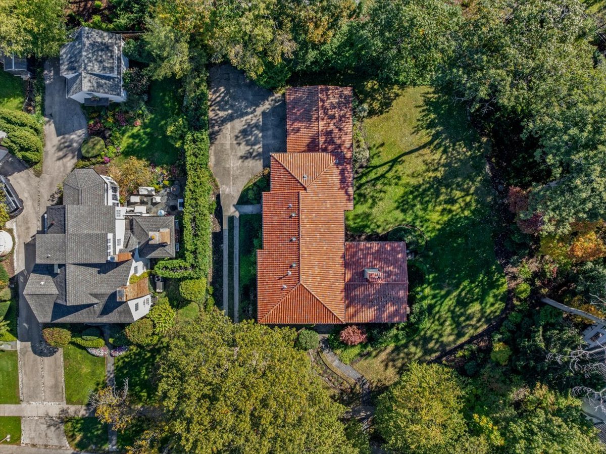 260 Oxford Road Kenilworth, IL 60043 - Photo 9 of 61 an aerial view of a house with a garden and trees